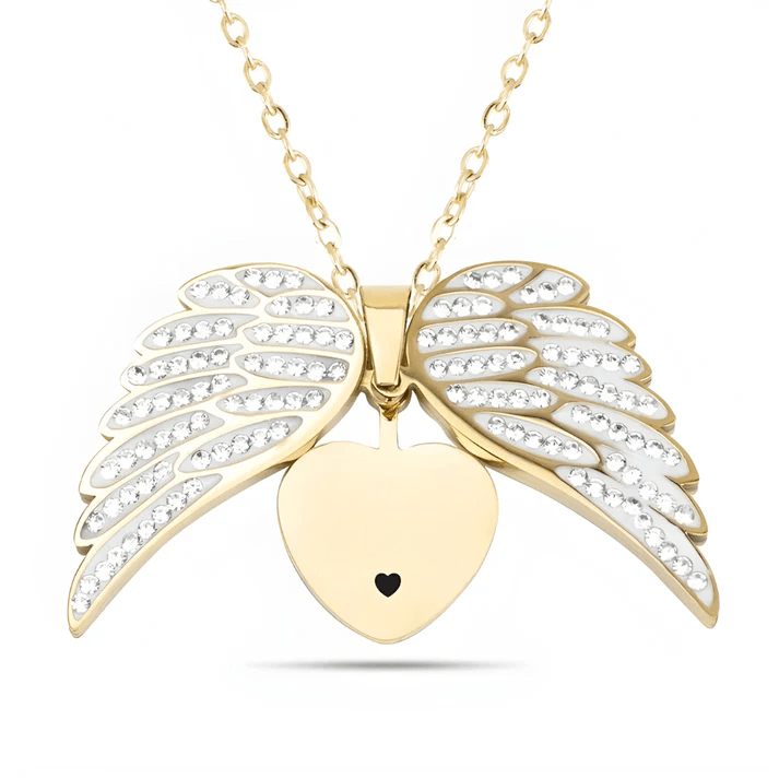 Gold heart pendant with angel wings, symbolizing love and protection, on chain by ORLA.