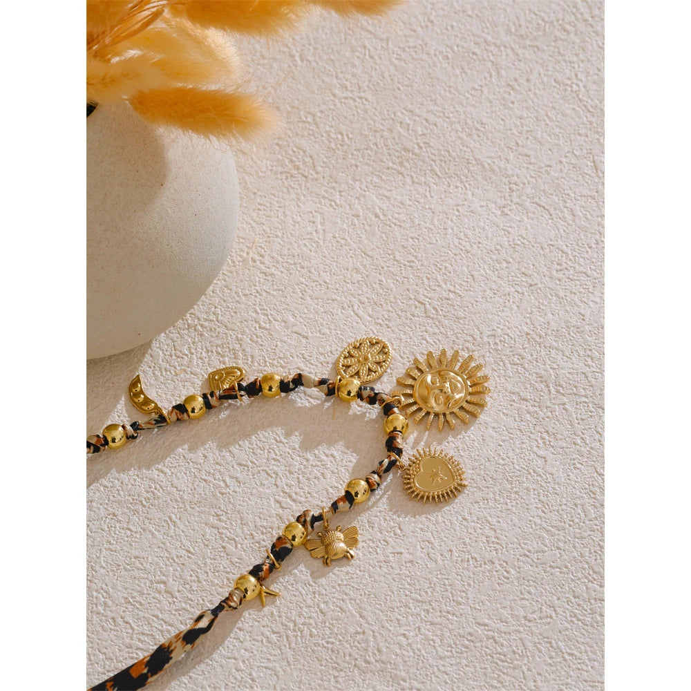 ORLA's 18K gold-plated leopard sunflower necklace. Hypoallergenic and waterproof.