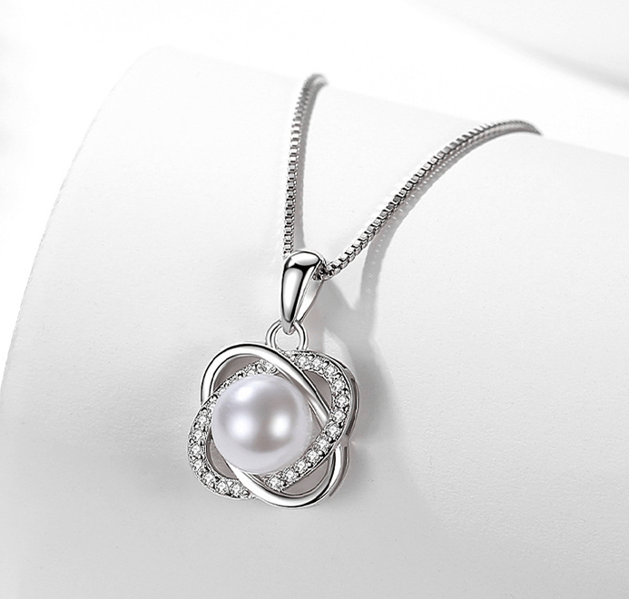 ORL’A Clover Pearl Pendant Necklace in 925 silver with chain symbol of love, hope, luck. ORLA Jewelry Store.