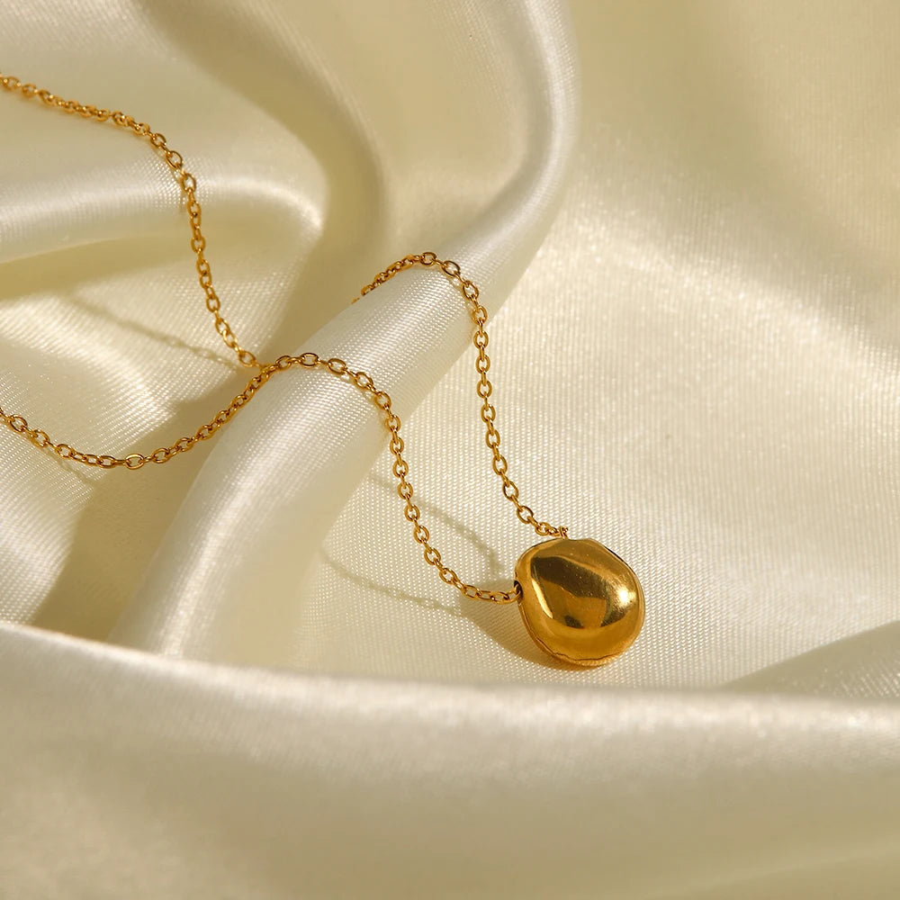 Back view of Orla Jewelry Store pearl pendant necklace showcasing gold-tone stainless steel chain and clasp — elegant and durable finish