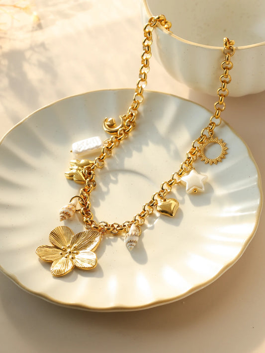 ORL'A Jewlery Store Celestial Pearl Necklace styled on white plate 